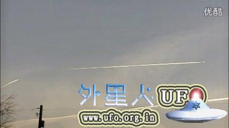 2014年12月11日宾夕法尼亚州喷洒飞机尾迹上方的UFO的图片