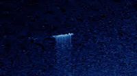 巨型UFO太阳附近射出光束